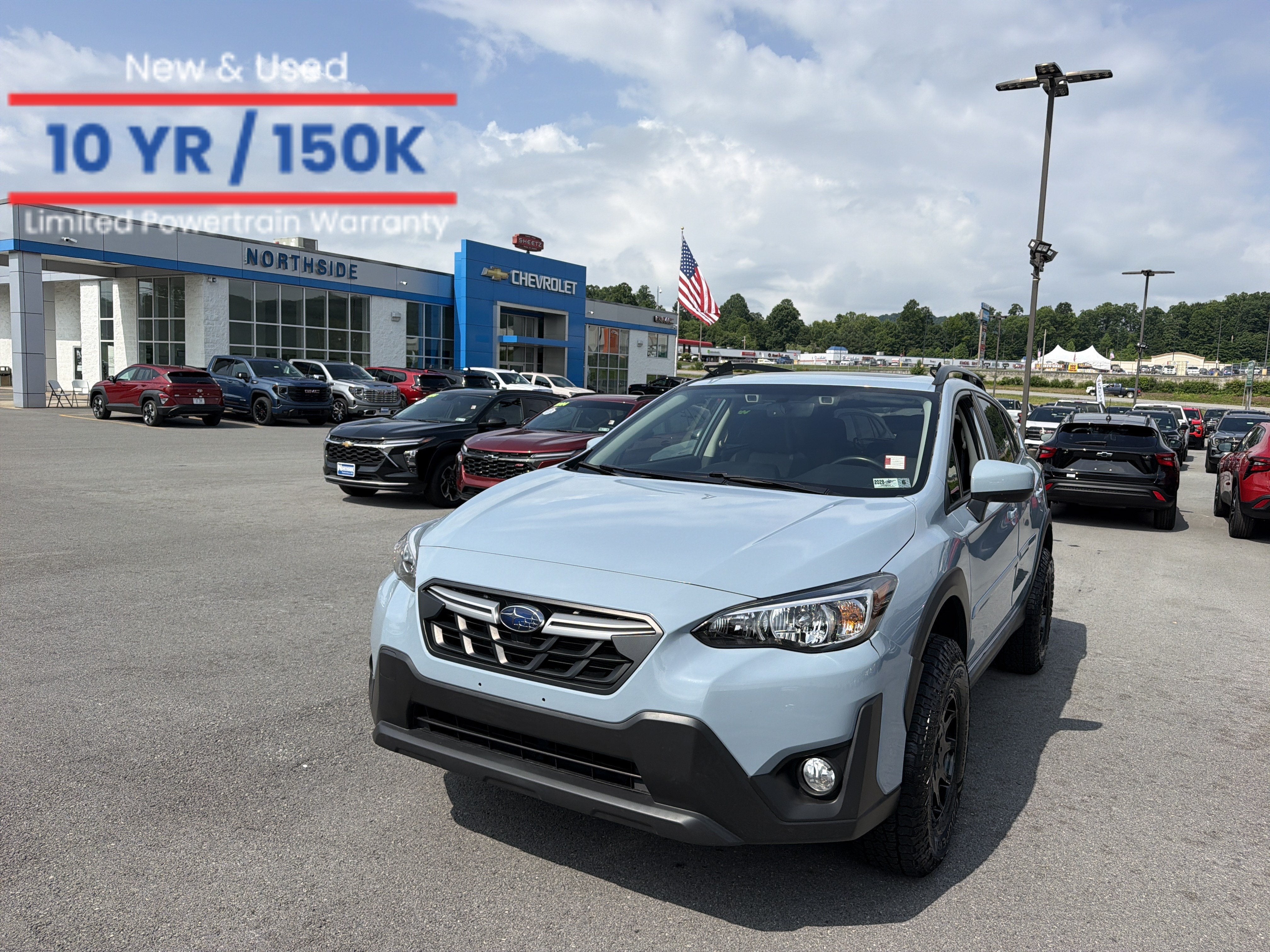 2021 Subaru Crosstrek Premium in Cool Gray Khaki — front three-quarter view