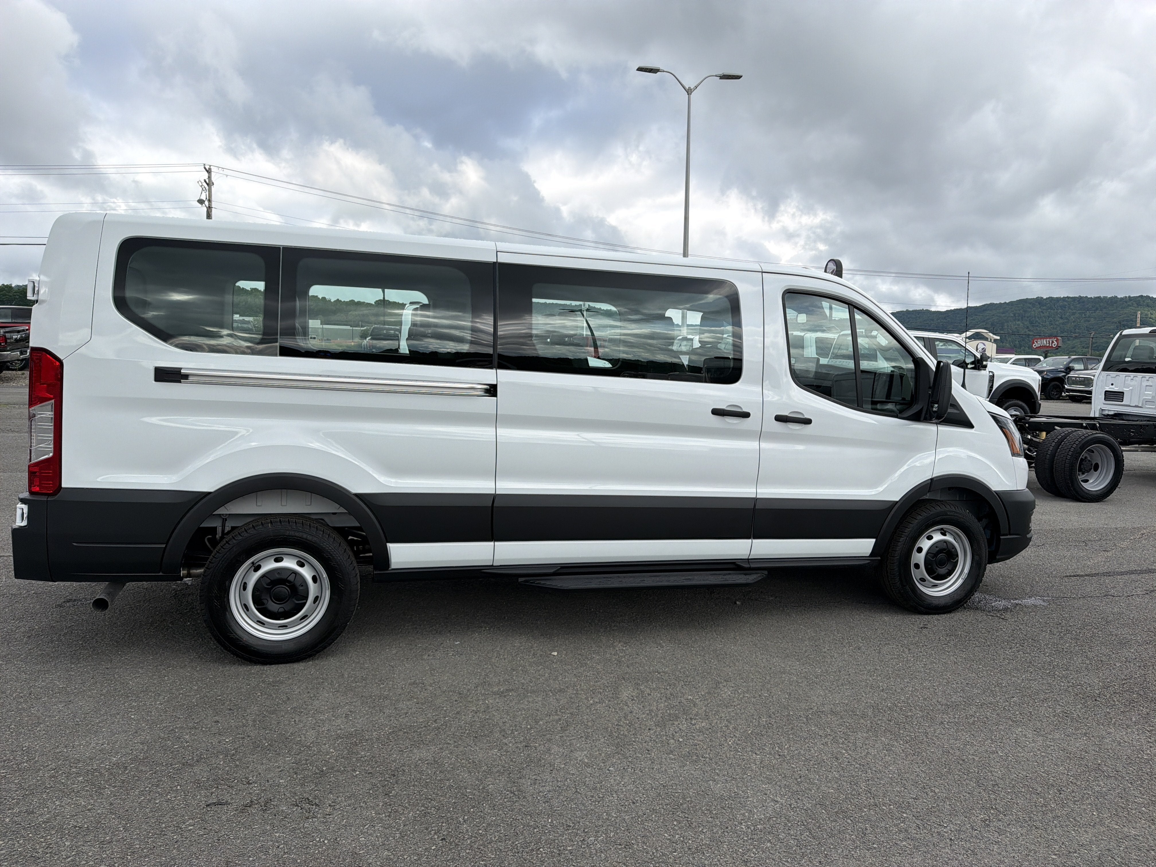 2026 Ford Transit Passenger Wagon — rear three-quarter view