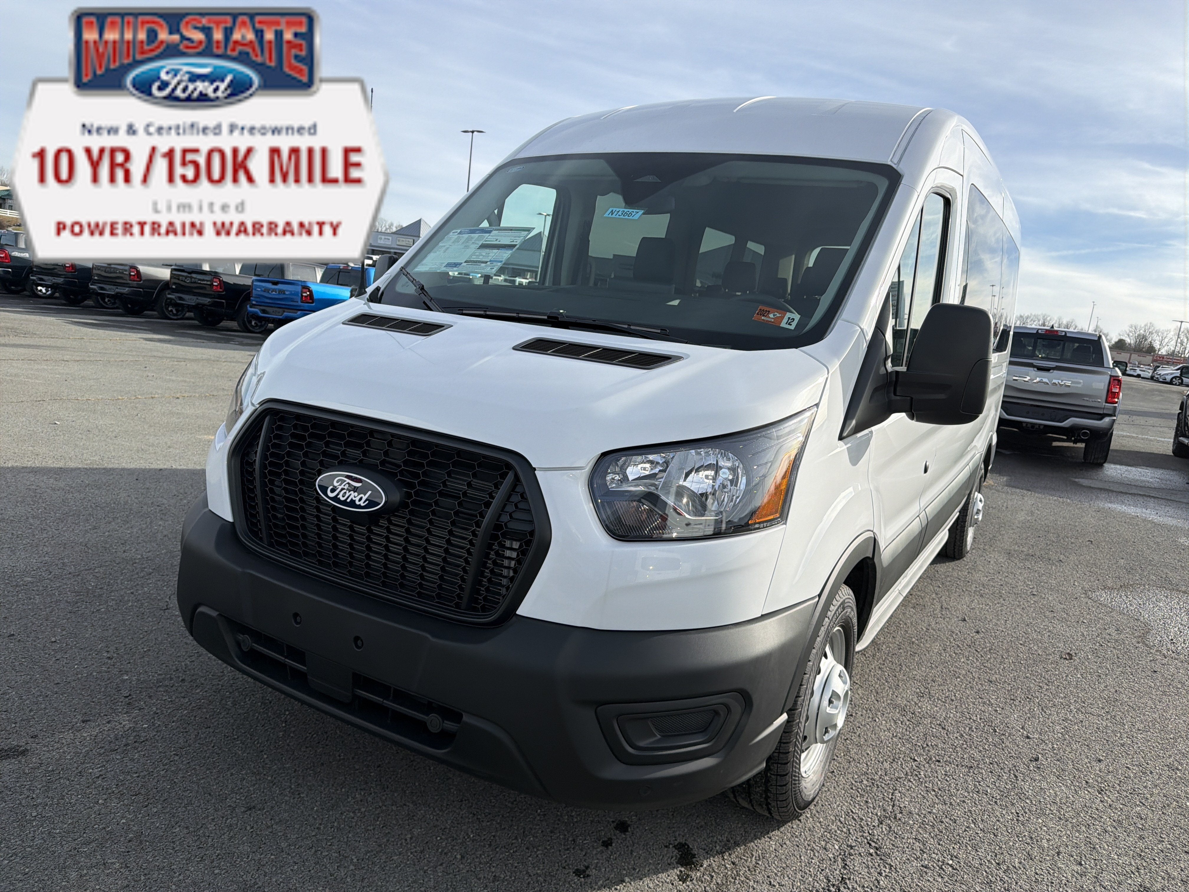 2026 Ford Transit Passenger Wagon XL in Oxford White — front three-quarter view