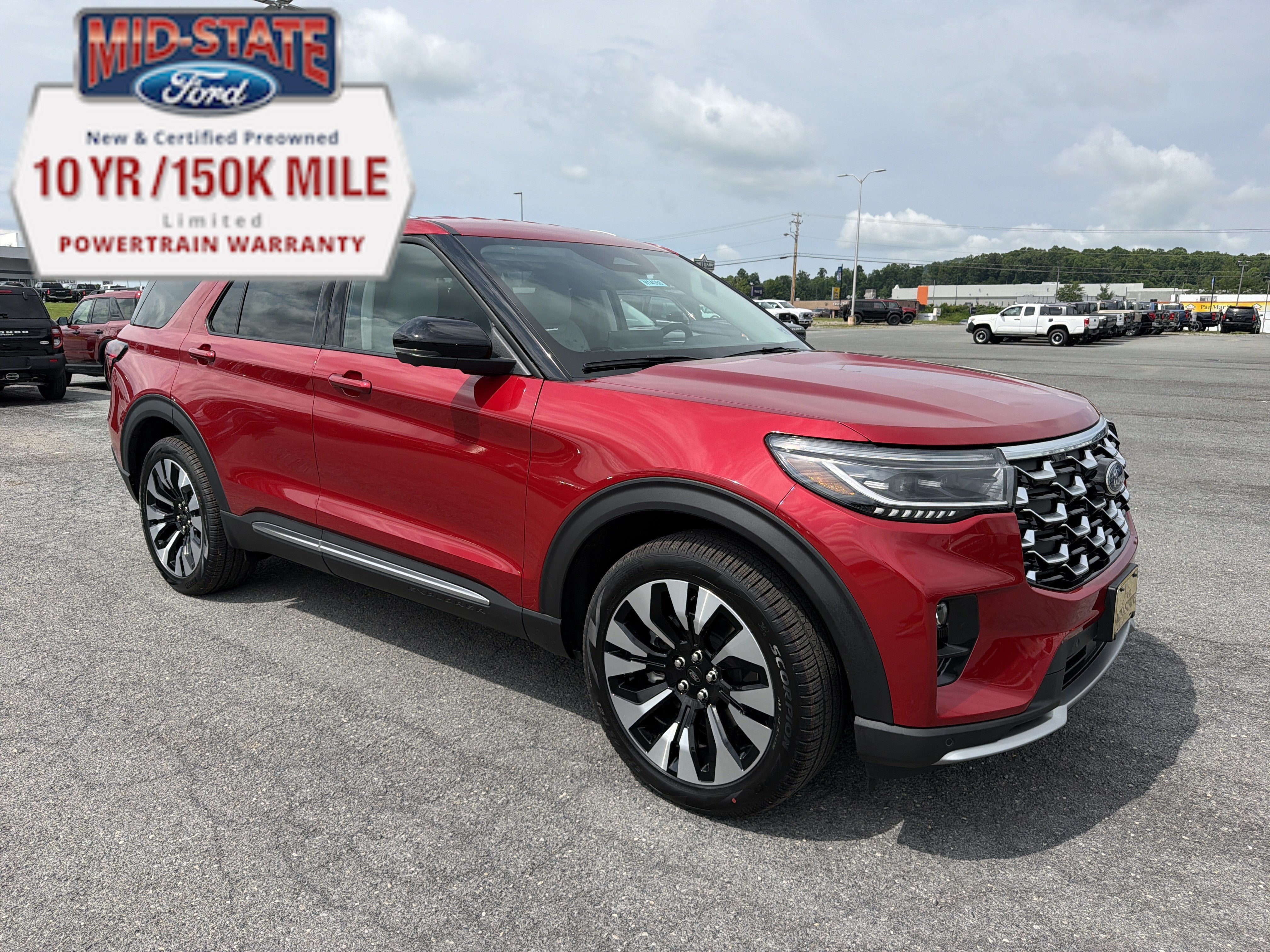 2026 Ford Explorer Platinum in Rapid Red Metallic Tinted Clearcoat — front three-quarter view