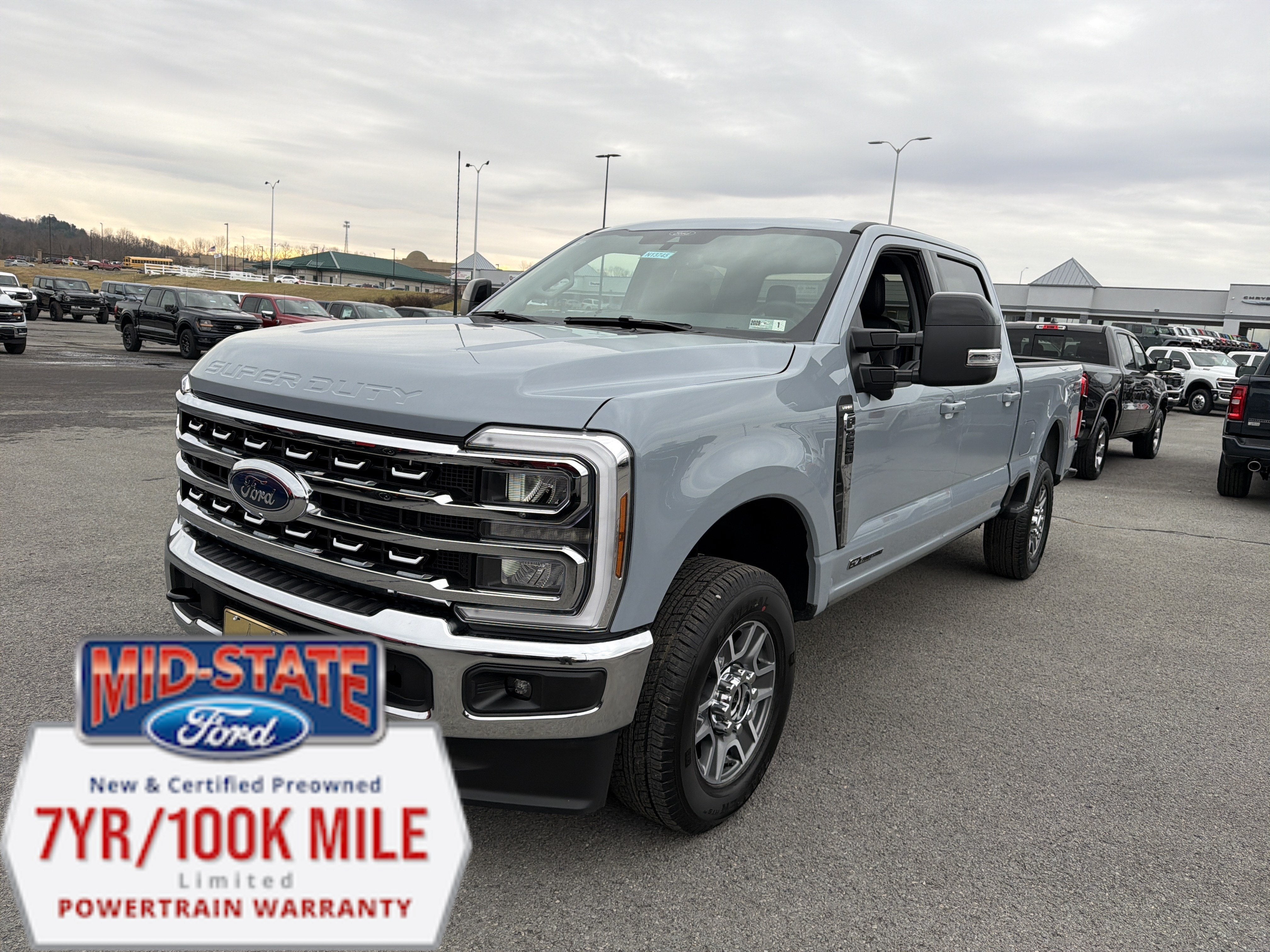 2026 Ford Super Duty F-250 SRW LARIAT in Glacier Gray Metallic Tri-Coat — front three-quarter view