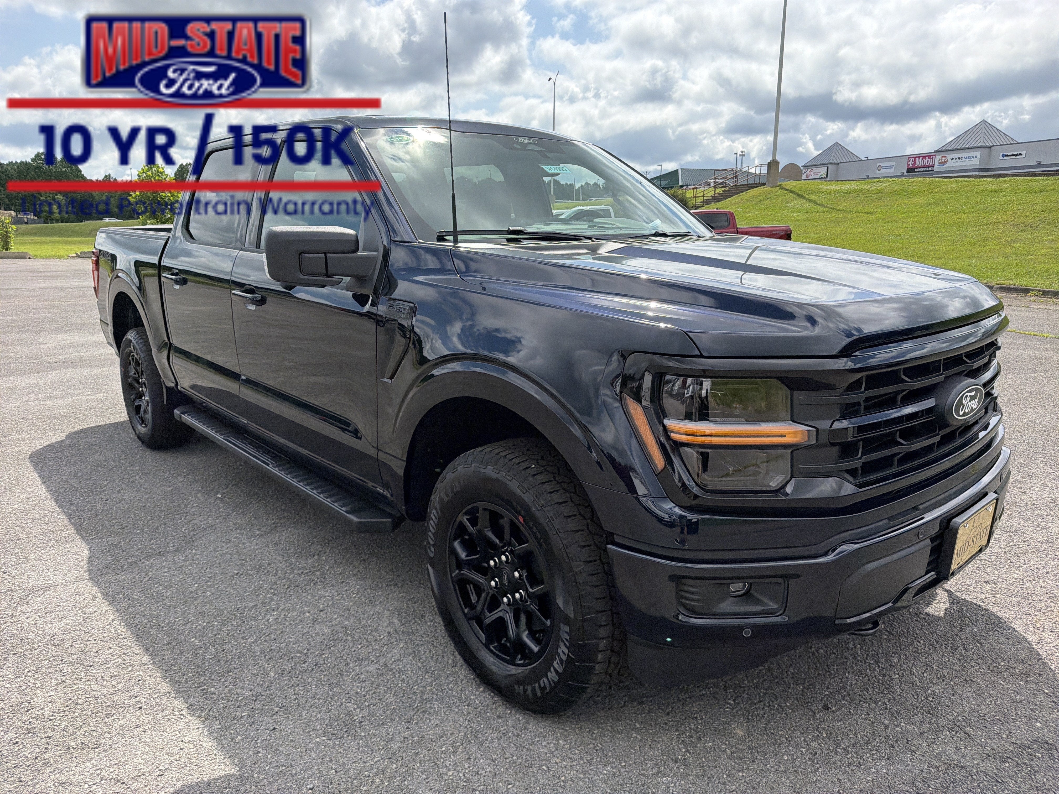 2026 Ford F-150 XLT in Antimatter Blue Metallic — front three-quarter view