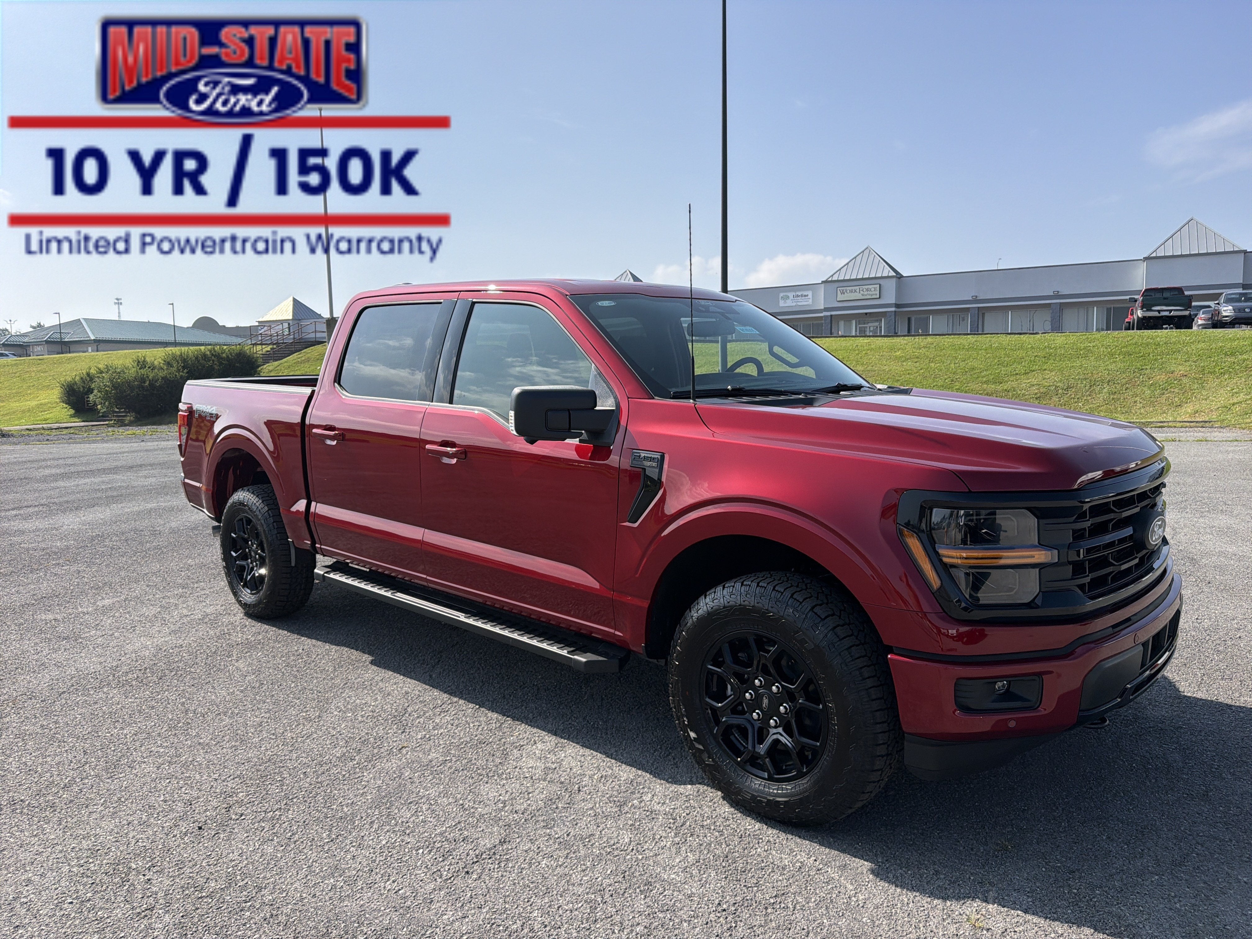 2026 Ford F-150 XLT in Ruby Red Metallic Tinted Clearcoat — front three-quarter view