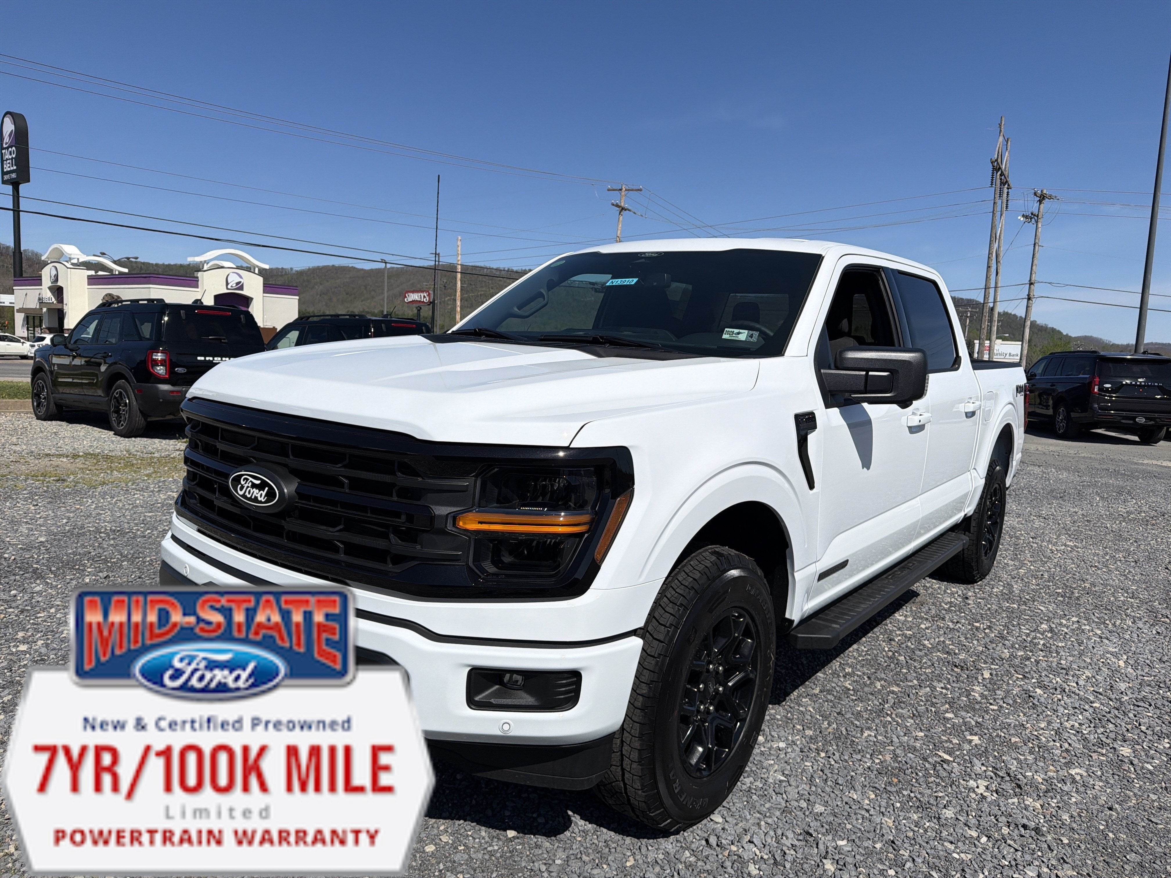 2026 Ford F-150 XLT in Oxford White — front three-quarter view