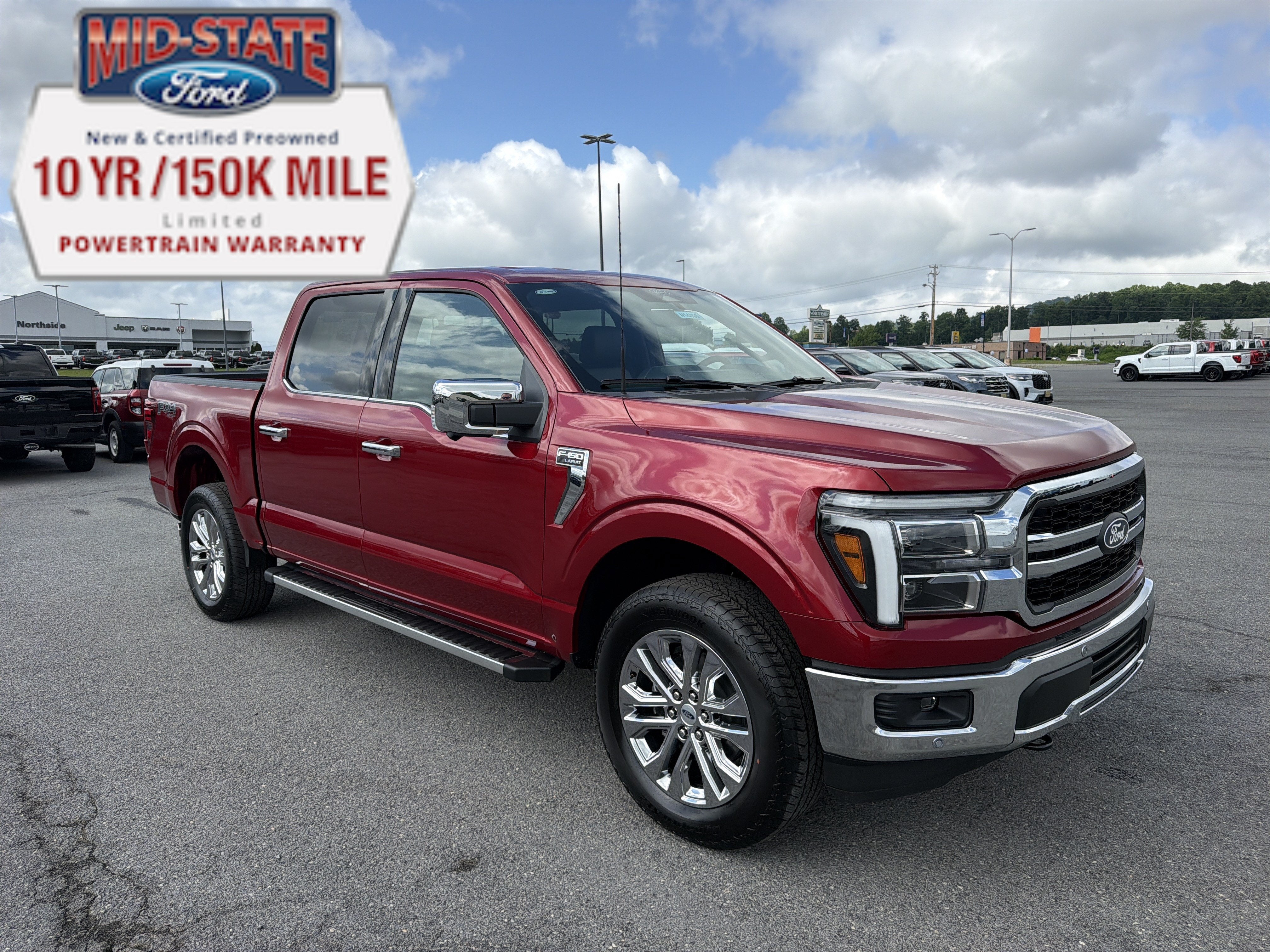 2026 Ford F-150 LARIAT in Ruby Red Metallic Tinted Clearcoat — front three-quarter view
