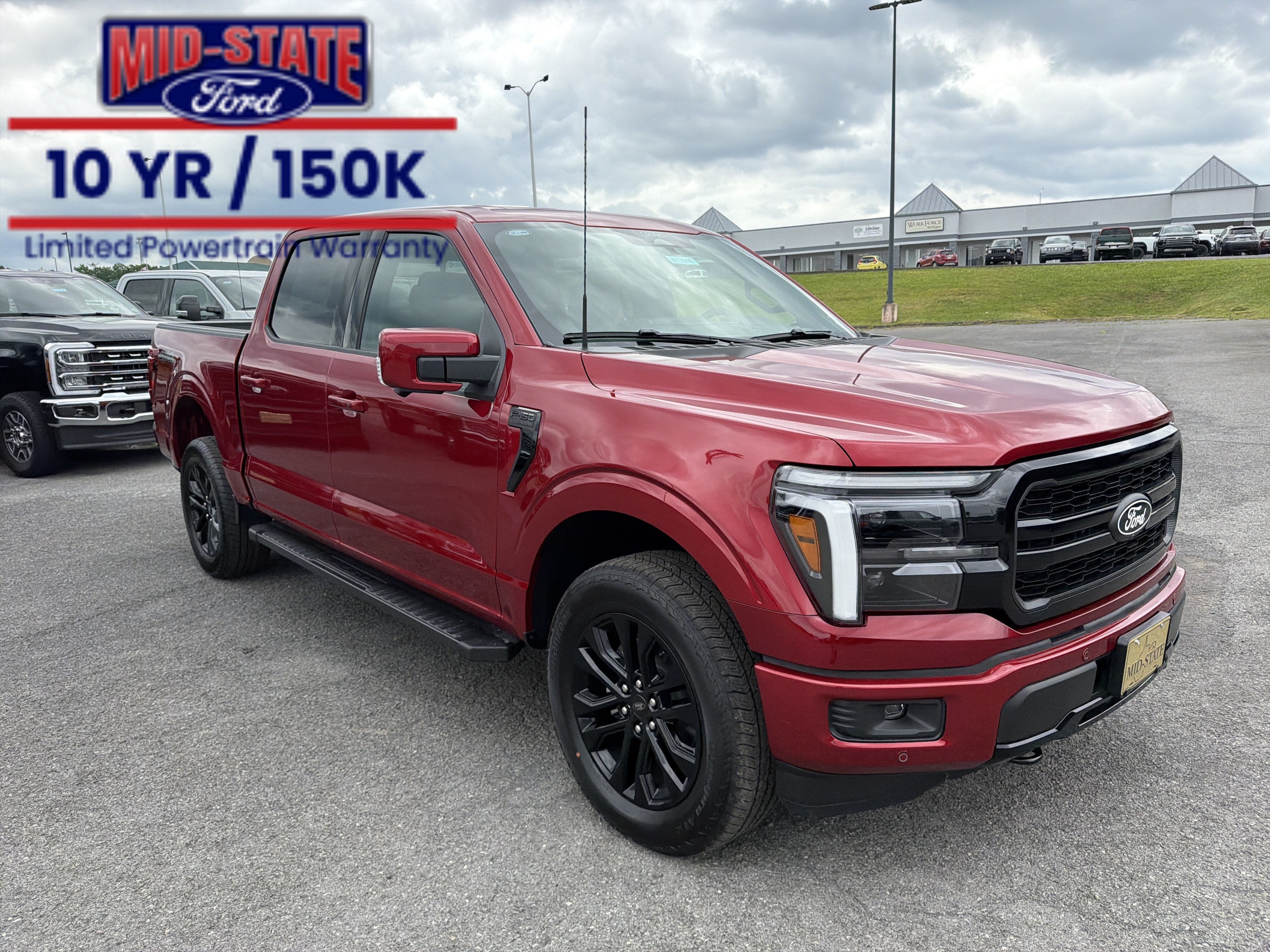 2026 Ford F-150 LARIAT in Ruby Red Metallic Tinted Clearcoat — front three-quarter view