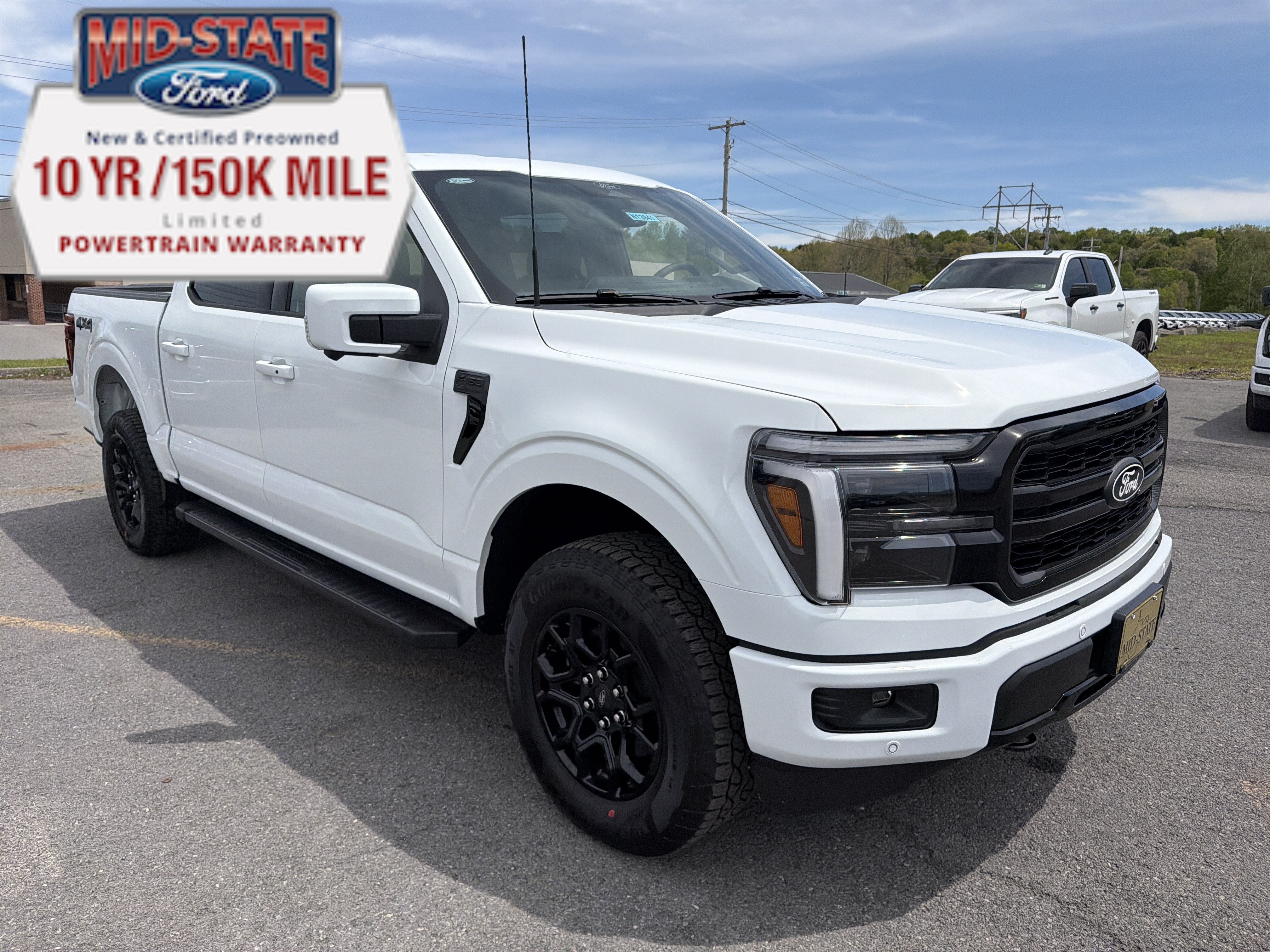 2026 Ford F-150 LARIAT in Oxford White — front three-quarter view