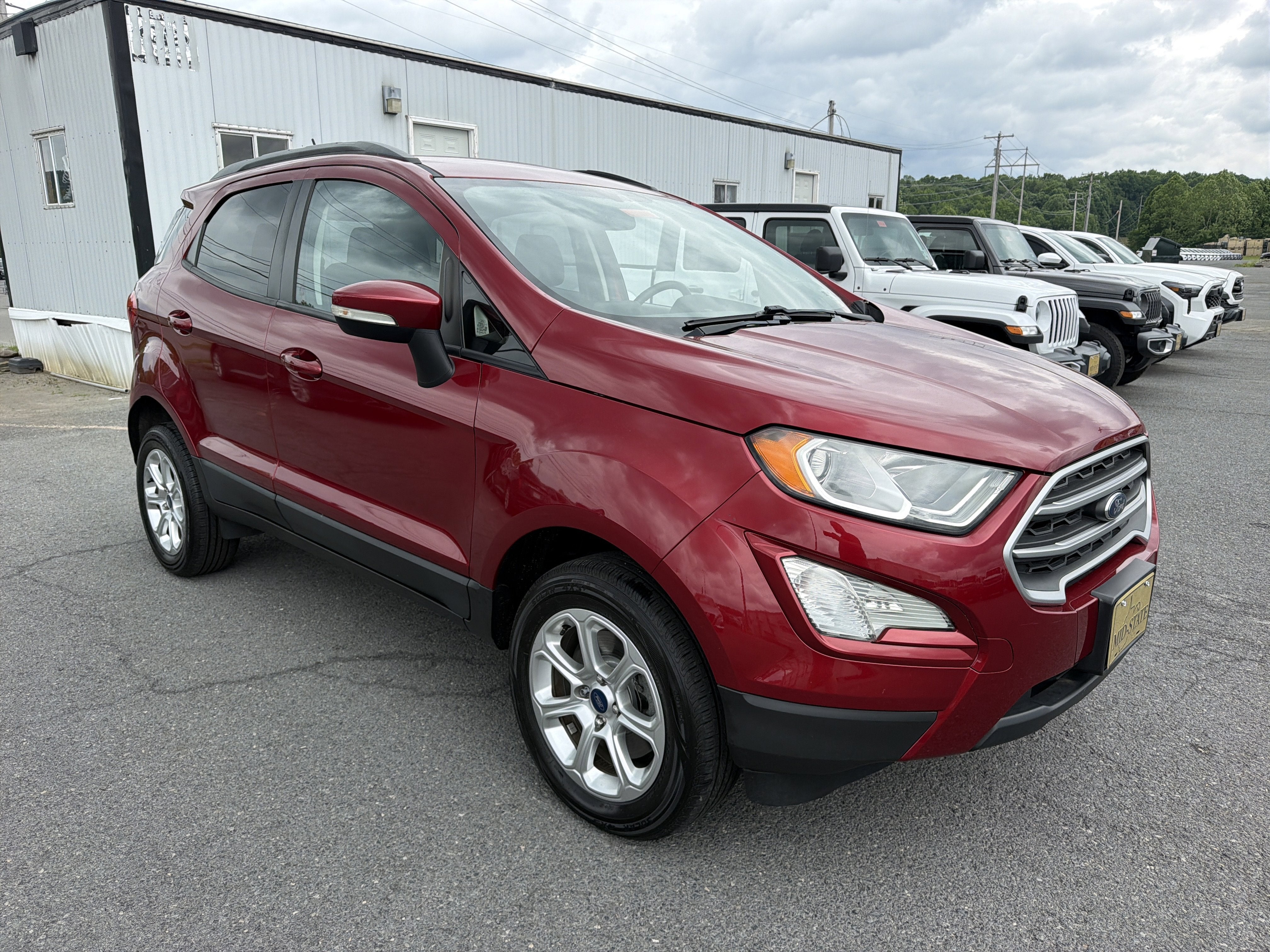 2018 Ford EcoSport SE in Ruby Red Metallic — front three-quarter view